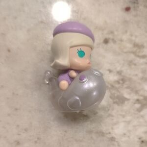 Purple and Silver Figurine
